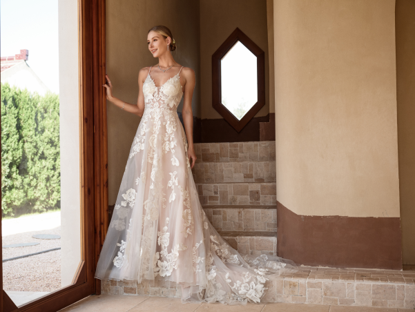 Model in lace wedding dress posing