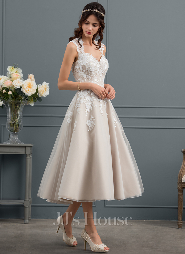 Model in vintage tea length wedding dress